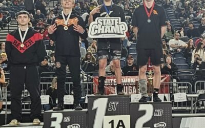 MAKING HISTORY- A three-peat state champion